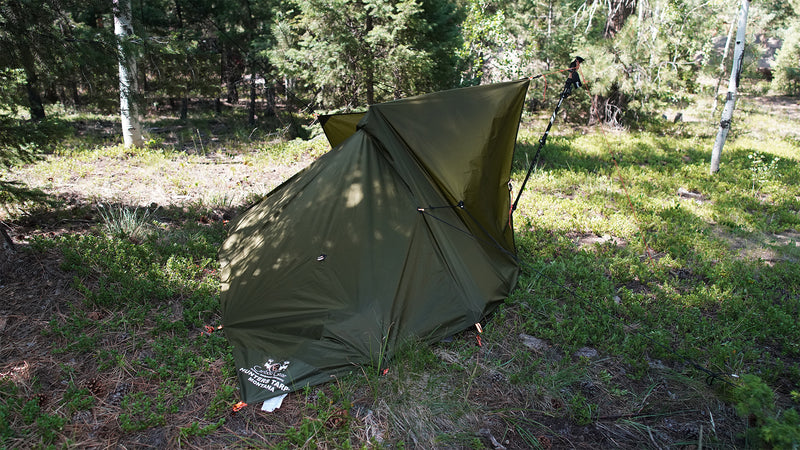 Load image into Gallery viewer, montana hunters tarp pitched as backcountry shelter