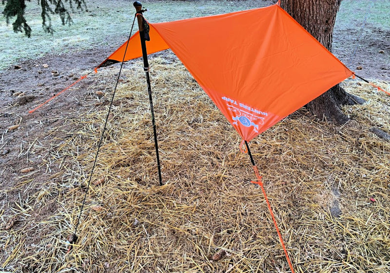 Load image into Gallery viewer, The Hunters Tarp Being Used As A Personal Shelter