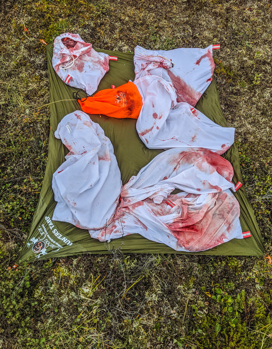 Synthetic and cotton hunting game bag materials compared before a Western big game hunt