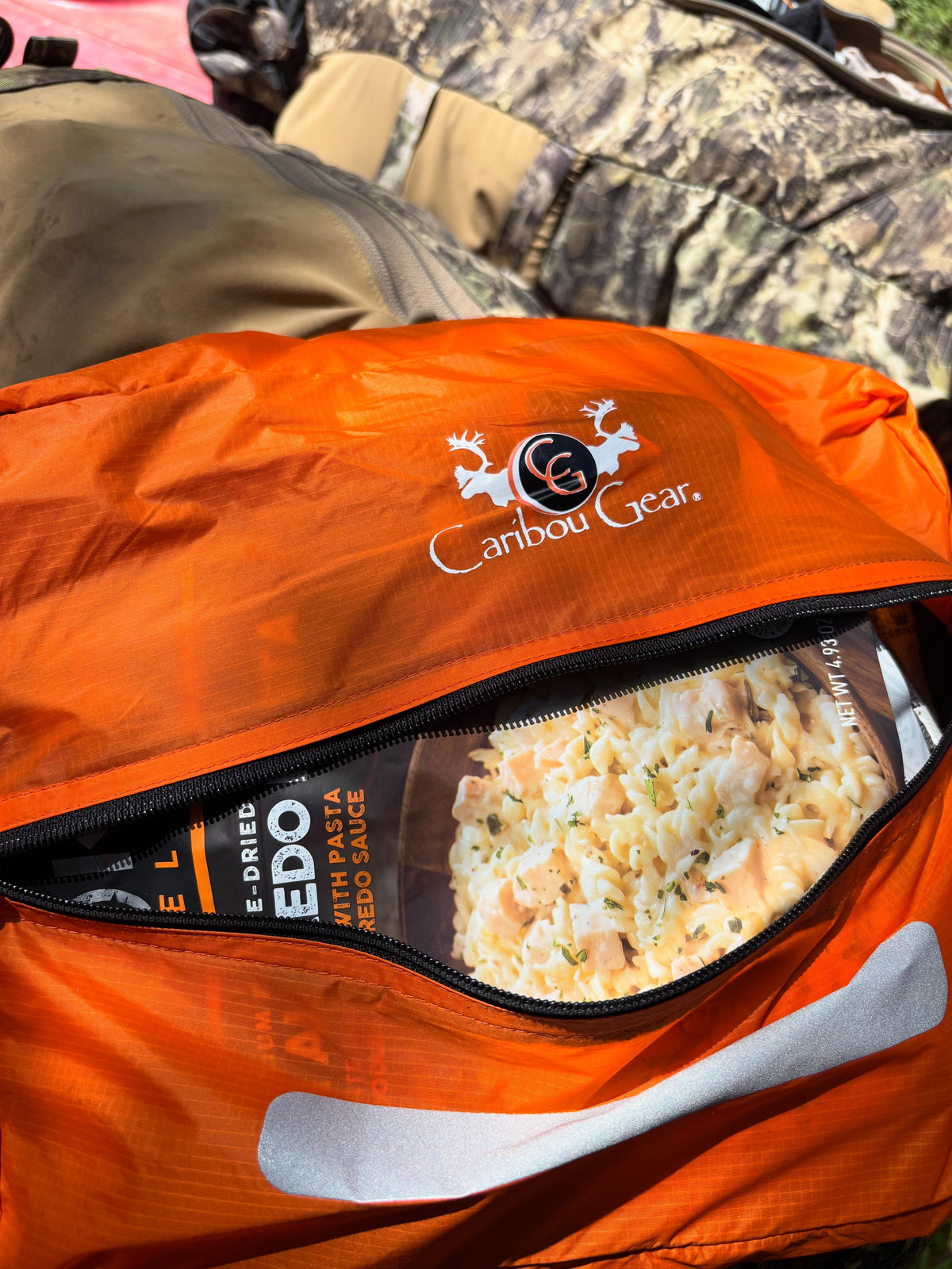 Hunting kill kit checklist staged in a Ditty Bag with game bags, Hunter’s Tarp, gloves, cordage, and knives for backcountry meat care