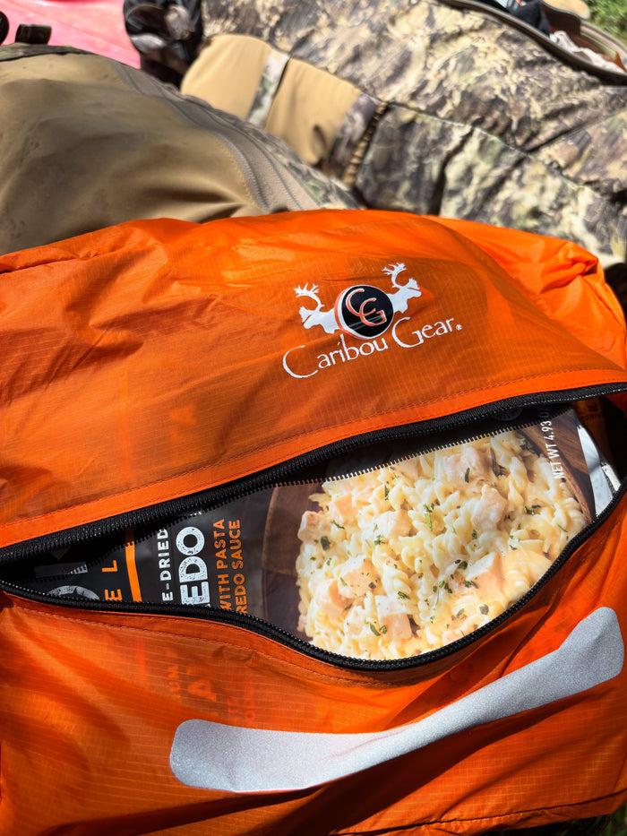 Hunting kill kit checklist staged in a Ditty Bag with game bags, Hunter’s Tarp, gloves, cordage, and knives for backcountry meat care