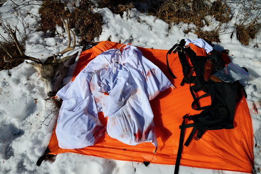 The Hunters Tarp Protecting Caribou Gear Game Bags 